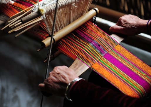 local women weave magic into silk in Ock Pop Tok